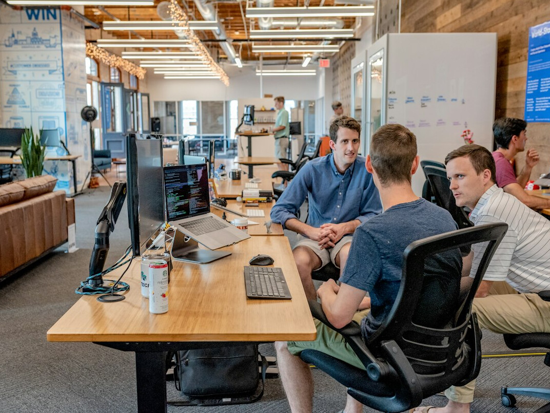team of developers in meeting